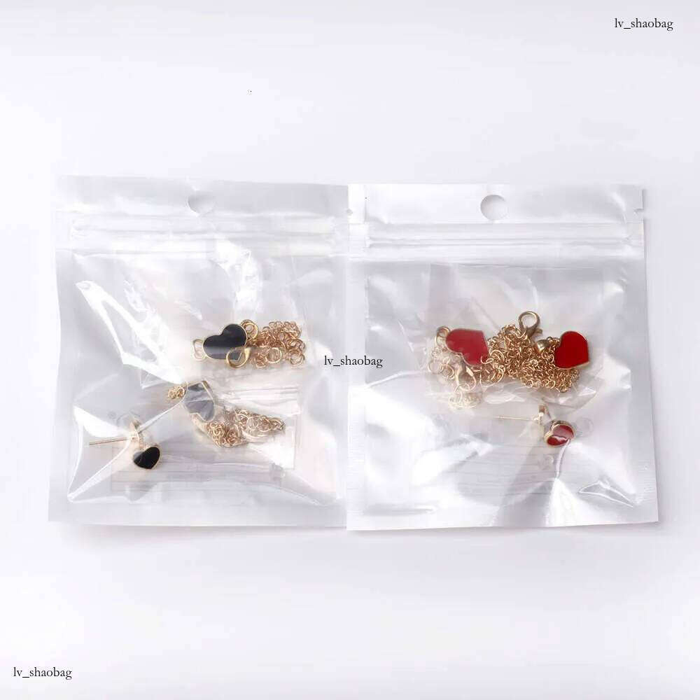 DHCollections 2025 Spring Heart Jewelry - Minimalist Necklace Bracelet Earrings Set for Women (2 Color Options)