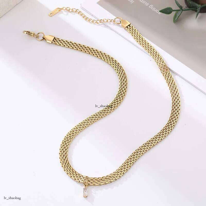 DHcollections Ins Niche Design Chain Inlaid Snake Bone for Women Gold-Plated Non-Fading Titanium Steel Necklace