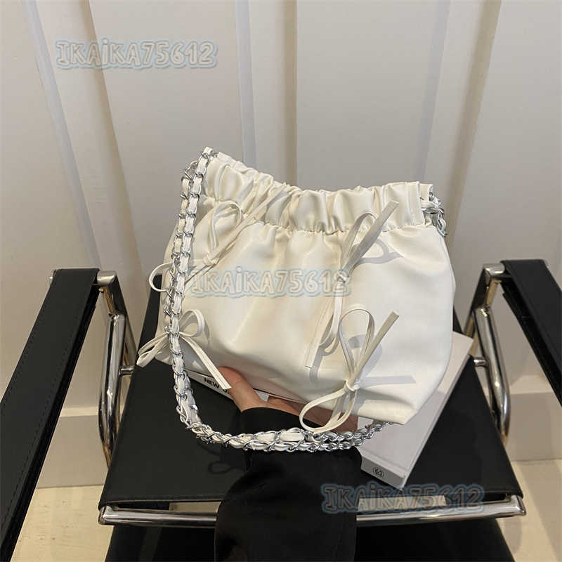 Solid Color Womens Bag 2025 Summer New Versatile Simple Trendy Textured Bowknot Bucket Chain Trendy Shoulder Bag H250804