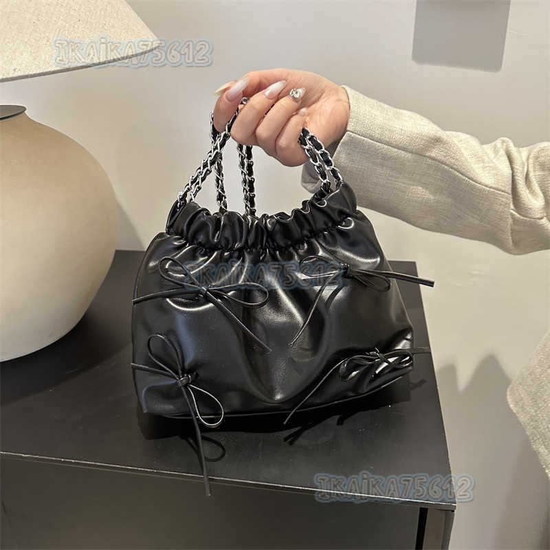 Solid Color Womens Bag 2025 Summer New Versatile Simple Trendy Textured Bowknot Bucket Chain Trendy Shoulder Bag H250804