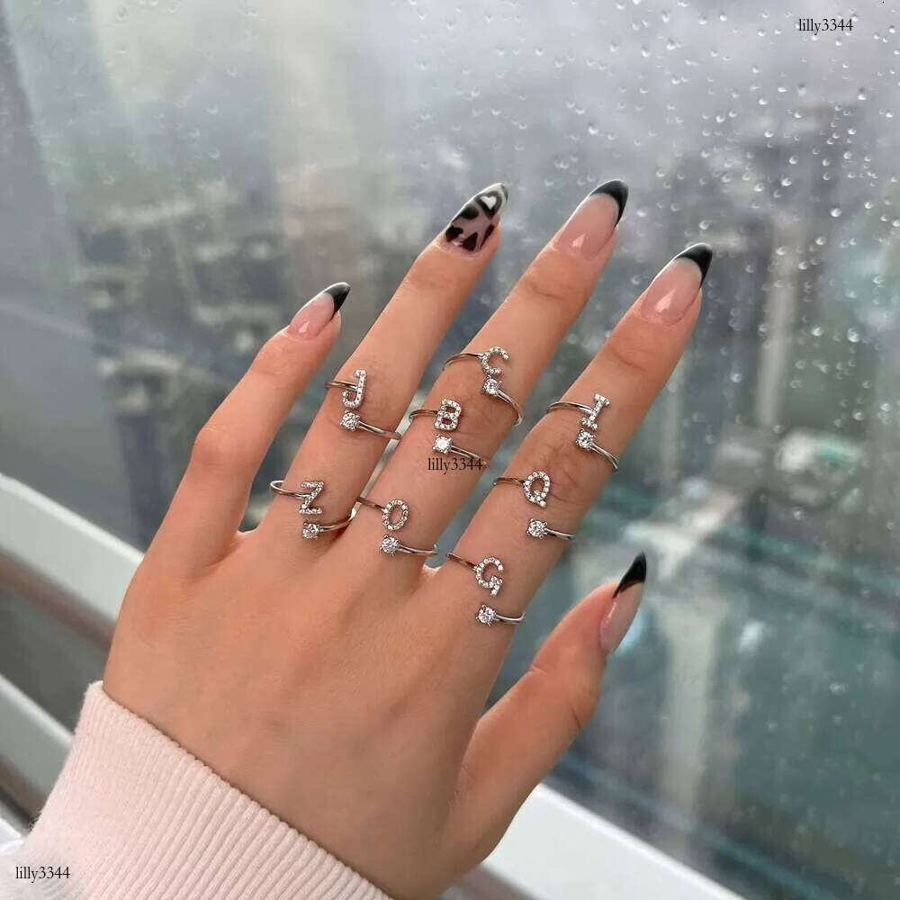 DHCollections Dylam Women's Sterling Sier Adjustable Size Engagement Commitment Statement Initial letters A-Z Wedding Ring