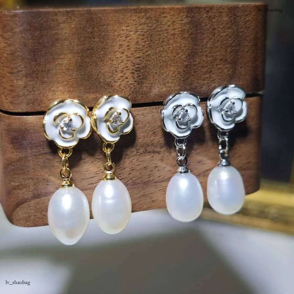 DHcollections Dan Tao S Sier Needle French Style Glazed Freshwater Rice-shaped Pearl Long Tassel Earrings for Women