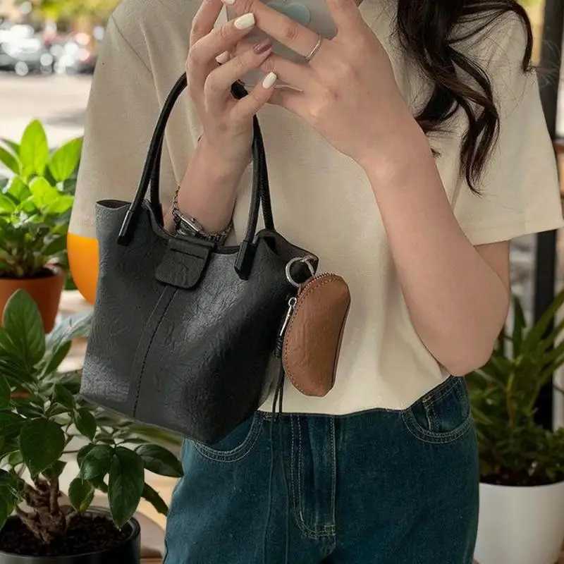 Modern Tanned Cowhide Mini Lipstick Bag Sophisticated Coin Wallet Womens Keychain G250802