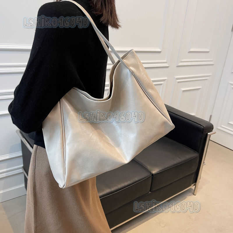 2025 New Self-made Bag Womens New Portable Bag Niche Design Versatile One Shoulder Leisure Armpit Bag H250804