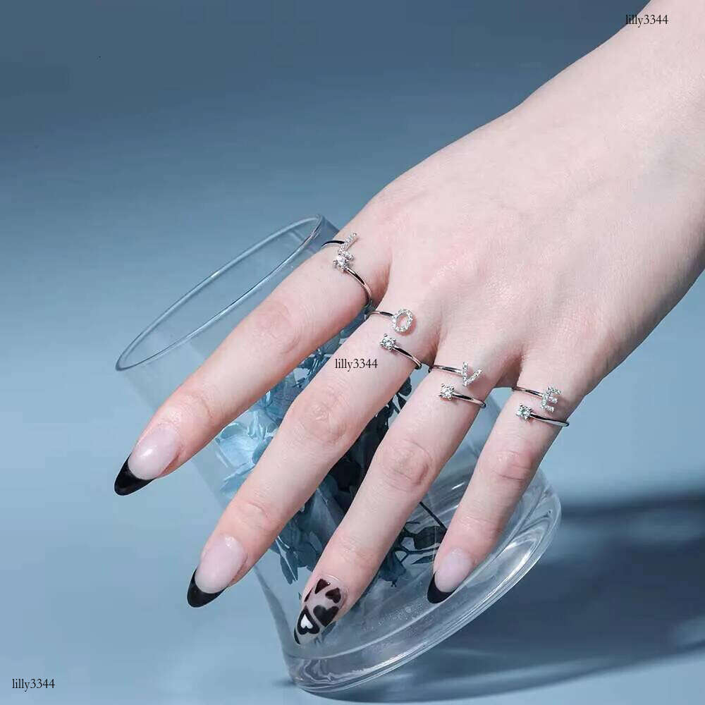 DHCollections Dylam Women's Sterling Sier Adjustable Size Engagement Commitment Statement Initial letters A-Z Wedding Ring