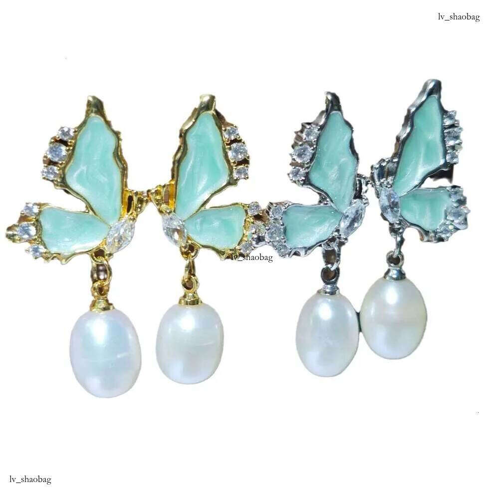 DHcollections Dan Tao S Sier Needle French Style Glazed Freshwater Rice-shaped Pearl Long Tassel Earrings for Women