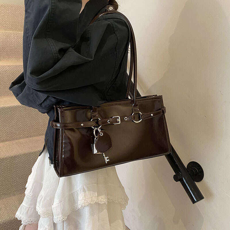 Sweet Cool Women's Handbag Simple Commuter Stylish bags Belt designer Fashion 2025 New Trend Motorcycle Shoulder Underarm Bag