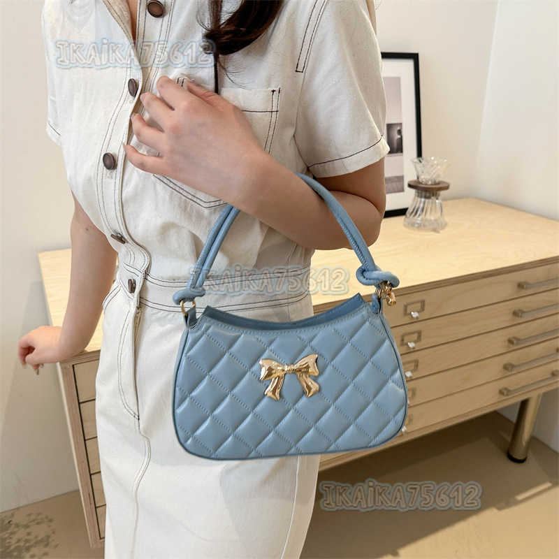 Textured Bow Handbag for Women 2025 New Summer Unique Crossbody Bag Niche Aesthetic Single Shoulder Crescent Bag H250804