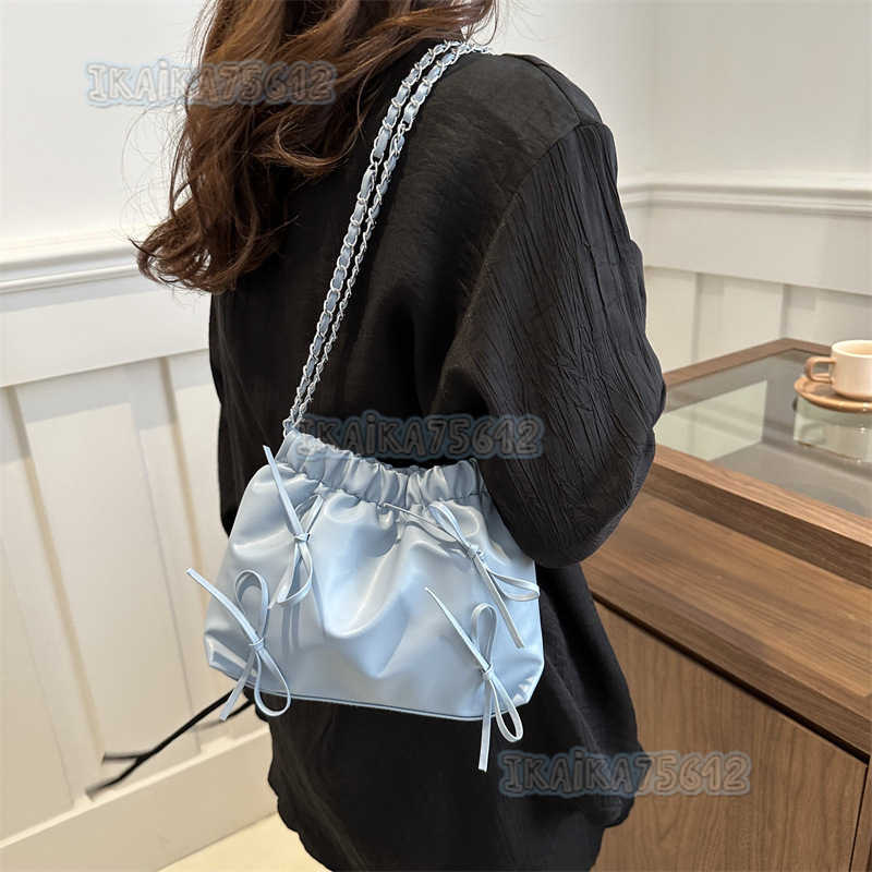 Solid Color Womens Bag 2025 Summer New Versatile Simple Trendy Textured Bowknot Bucket Chain Trendy Shoulder Bag H250804