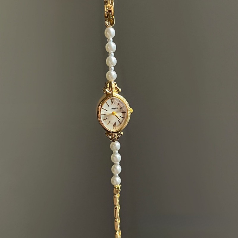 Chic Accessory for Her - Stylish White Pearl Band Coupled With Precision Quartz Mechanism