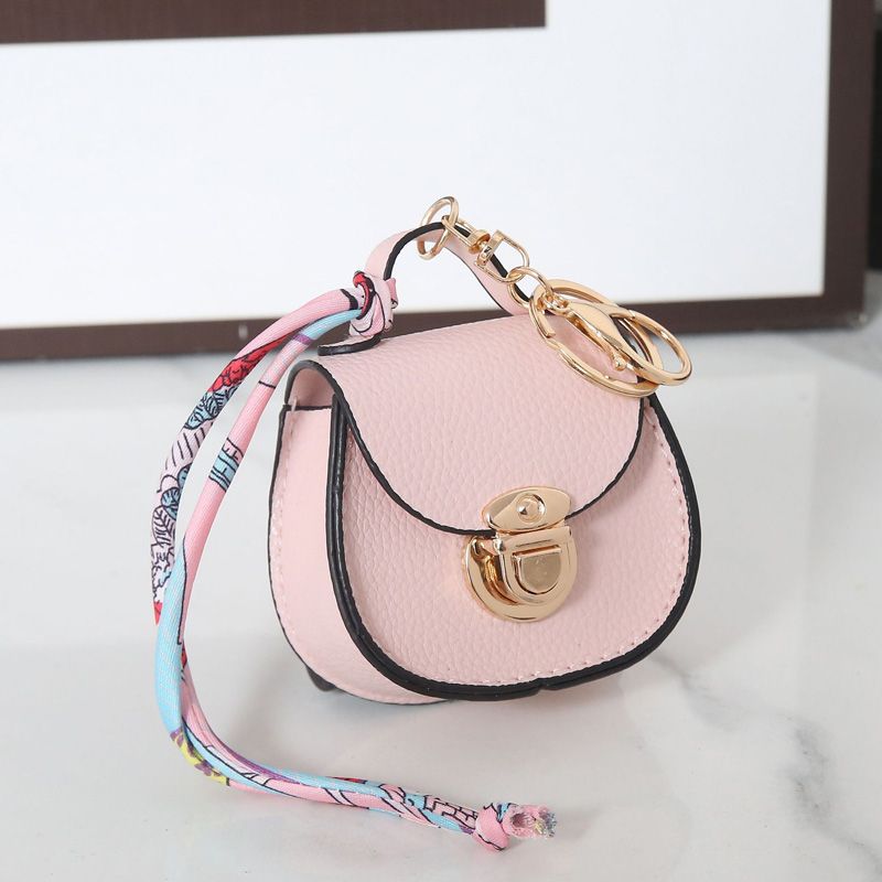 Luxury Designer Mini Saddle Headphone Bag Key Chain Bags Universal Headset Can hold other small items with keychain Storage Bags