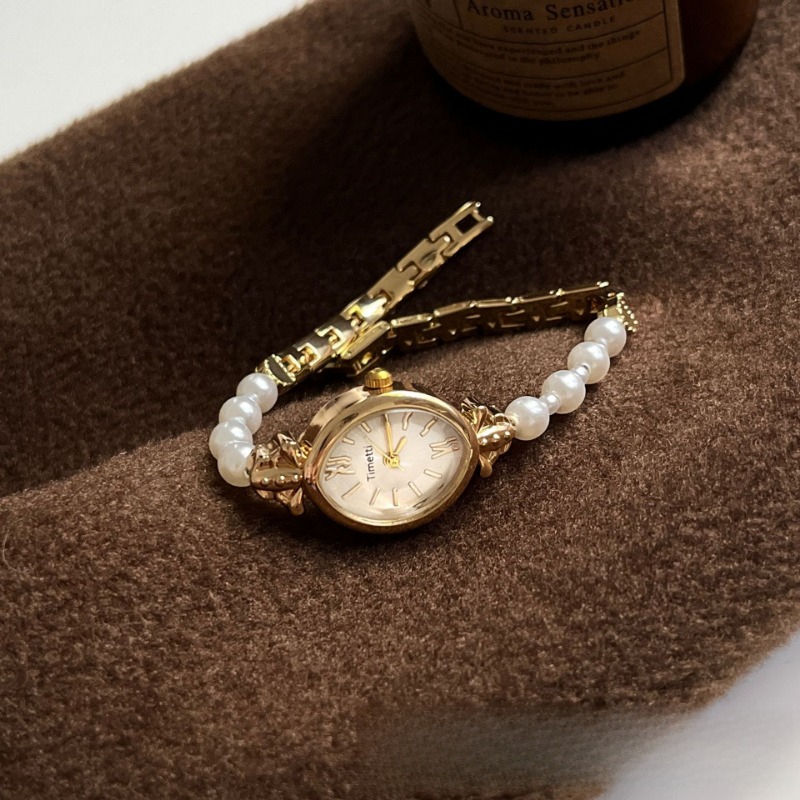 Chic Accessory for Her - Stylish White Pearl Band Coupled With Precision Quartz Mechanism