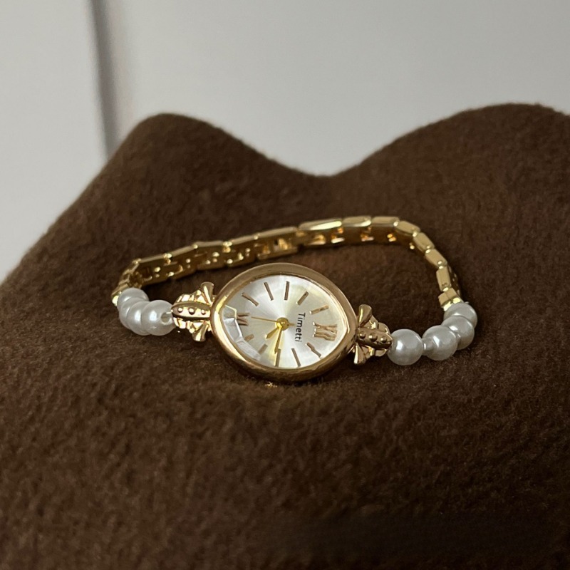 Chic Accessory for Her - Stylish White Pearl Band Coupled With Precision Quartz Mechanism