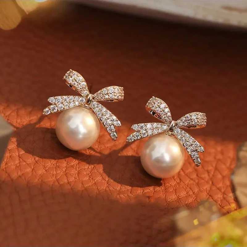 French Sweet Personality Pearl Simple And Small Design Sense Full Of Drill Bow Delicate All-match Earrings Female Y250804
