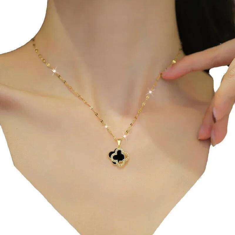 New dia-encrusted double-sided four-leaf clover necklace with feminine charm and a shell collarbone chain for girls 9527
