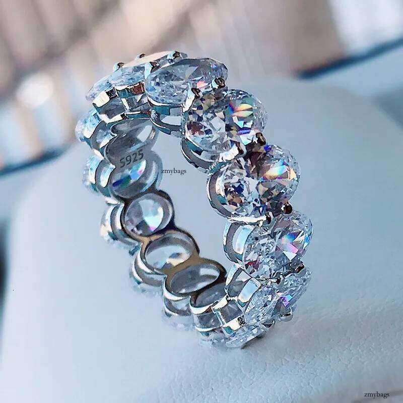 2025 Rulalei Ins Top Sell Gorgeous Jewelry Pure 100% Sterling Sier Oval Cut Stack Lab White Moissanite Dia Eternity Lady Women Wedding Band Ring Gift