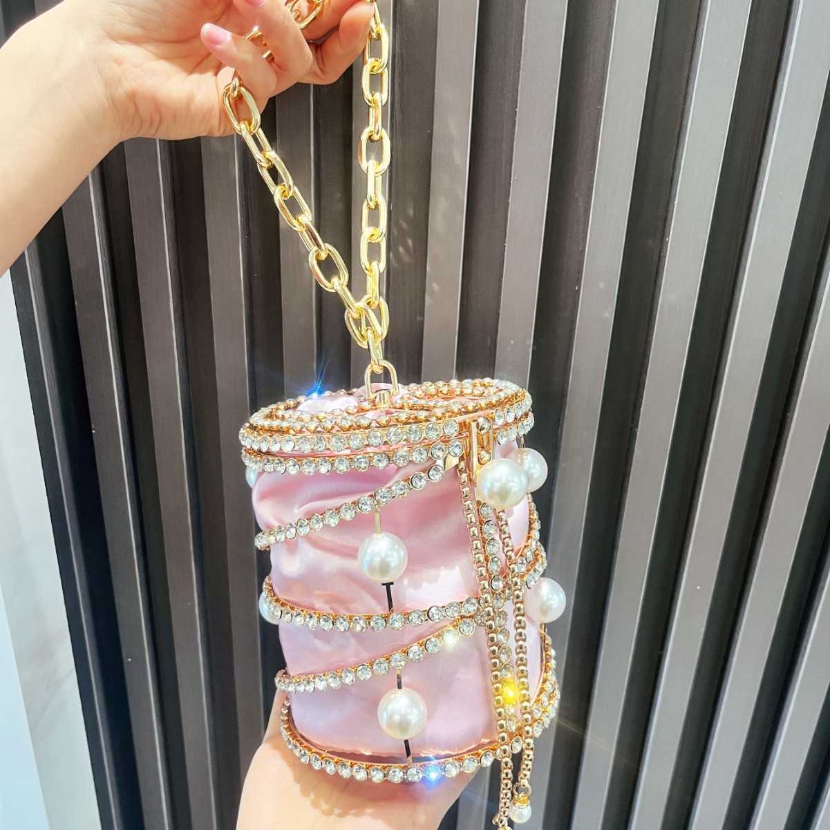 luxury bag designer bags 2025 New Women's Bag Metal Bucket Bag Pearl Inlaid Diamond Handbag Drawstring Chain Pig Cage Bag Bird Cage Bag
