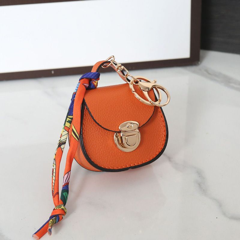 Luxury Designer Mini Saddle Headphone Bag Key Chain Bags Universal Headset Can hold other small items with keychain Storage Bags