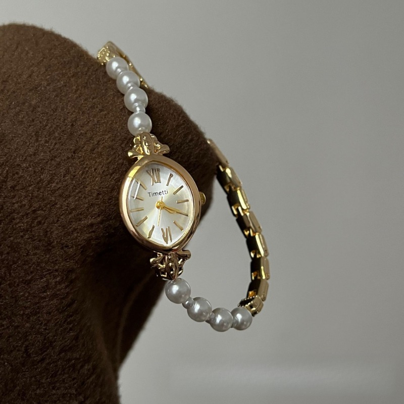 Chic Accessory for Her - Stylish White Pearl Band Coupled With Precision Quartz Mechanism