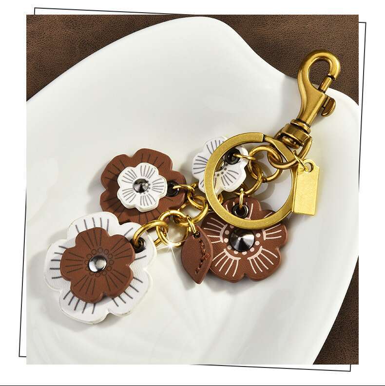 DHessentials Floral Cluster Bag Charm - Trendy PU Leather Flower Keychain for Women, Elegant Shoulder Bag Accessory (10cm, 30g)