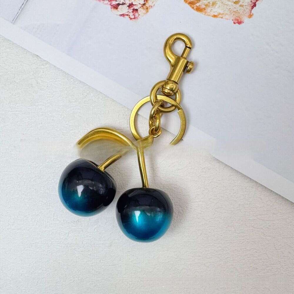 DHessentials Stylish Cherry Keychain - Fashion Resin Car Key Holder with Metal Hook, Cute Fruit Bag Charm Accessory for Women (6x12.5cm)