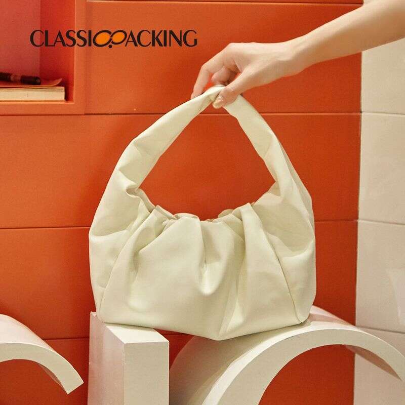 Sophisticated Ladies' Niche Designed Handbag - Soft Puff Cloud Shape for Versatile Carrying Styles