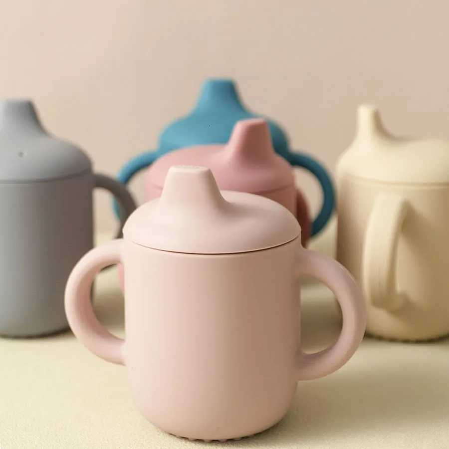 2025 1PCS Baby Feeding Silicone Cups for Infants and Young Children Portable Learning Hand Shank Drinking Water Cups Baby Stuff X2508061