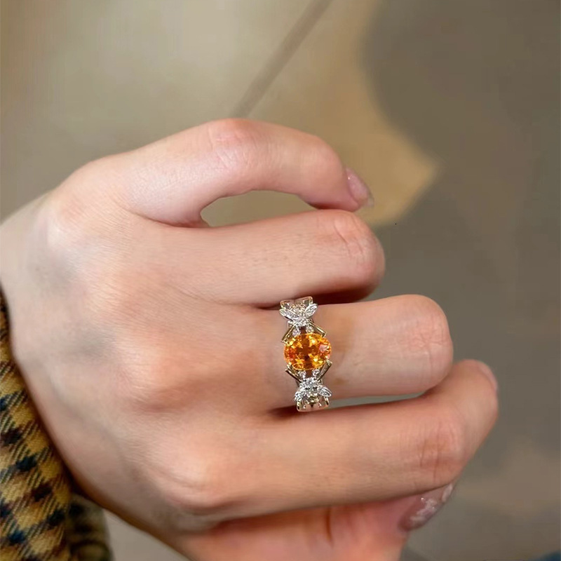 Hui Zhi Wing Jewelry Live Model S Silver Plated with Gold 7*9mm Oval Sunset Orange Ring Fashionable OL Style