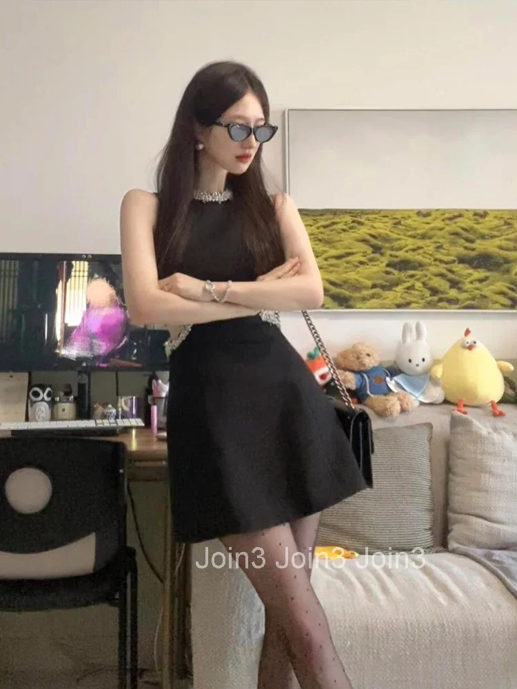 French Elegant Sexy Hot Girl Sleeveless Birthday Black Dress High End Waist Cinched Slimming Hollow A-line Mini Dress for Women