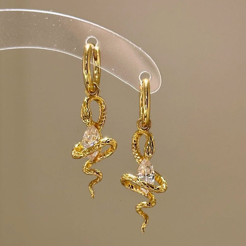 Hui Zhi Wing Jewelry New S Sier Snake Wrapped Horse Eye Earrings Light High-End Feel Ear Accessories