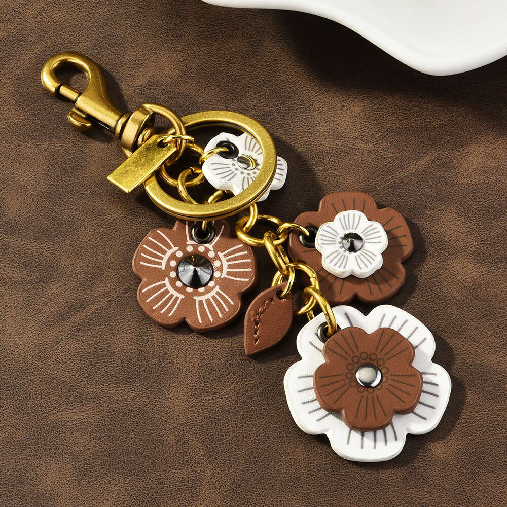DHessentials Floral Cluster Bag Charm - Trendy PU Leather Flower Keychain for Women, Elegant Shoulder Bag Accessory (10cm, 30g)