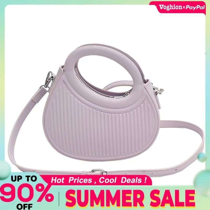 Niche design foreign style women 2023 new spring all-match solid color Messenger fold popular shoulder bag