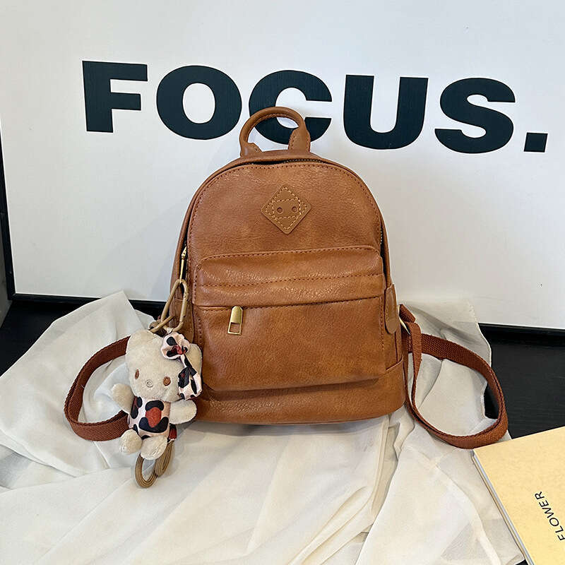 Designer Women's Soft Leather Academy Style Fashionable Multi functional Solid Color Small Backpack, Suitable for Daily Commuting, Travel, and Le