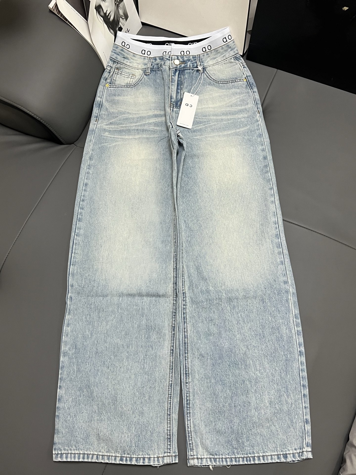 Fashion designer brand Mu* New style from luxury , cuffed logo jeans, straight-leg, retro, high-waisted, slimming, wide-leg pants in light blue.