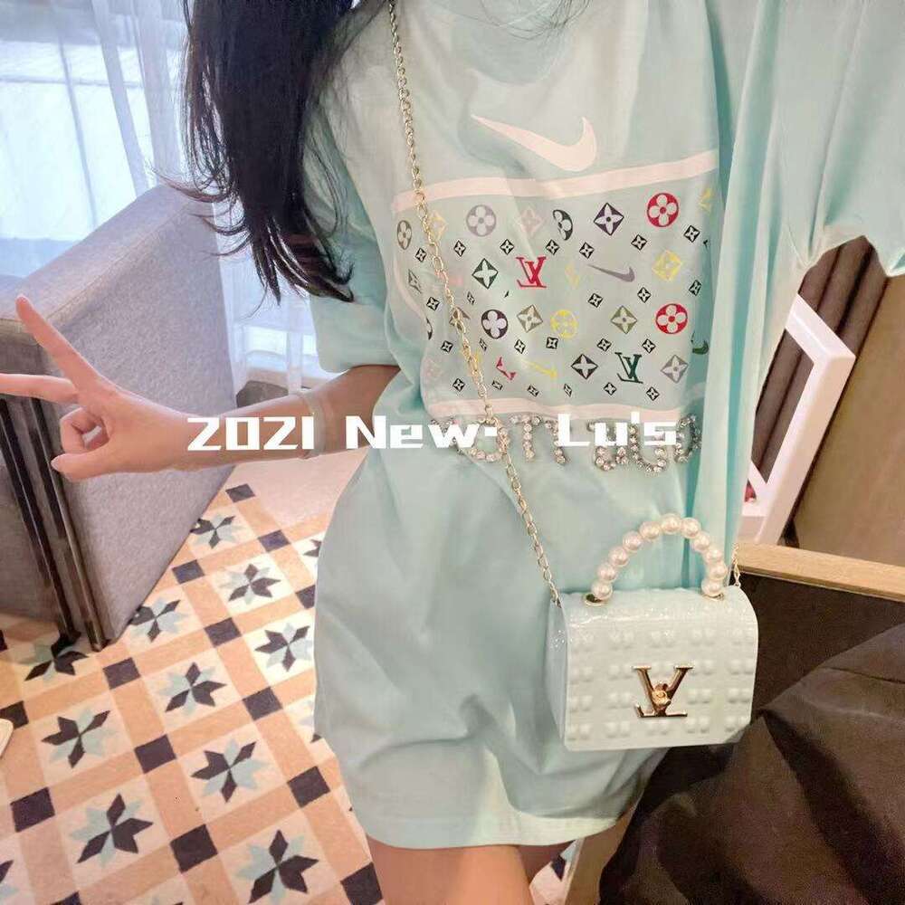 DHcollections 2025 New Pearl Handheld Mini Jelly Quilted Women's Candy Color Small Square Single Shoulder Crossbody Chain Bag