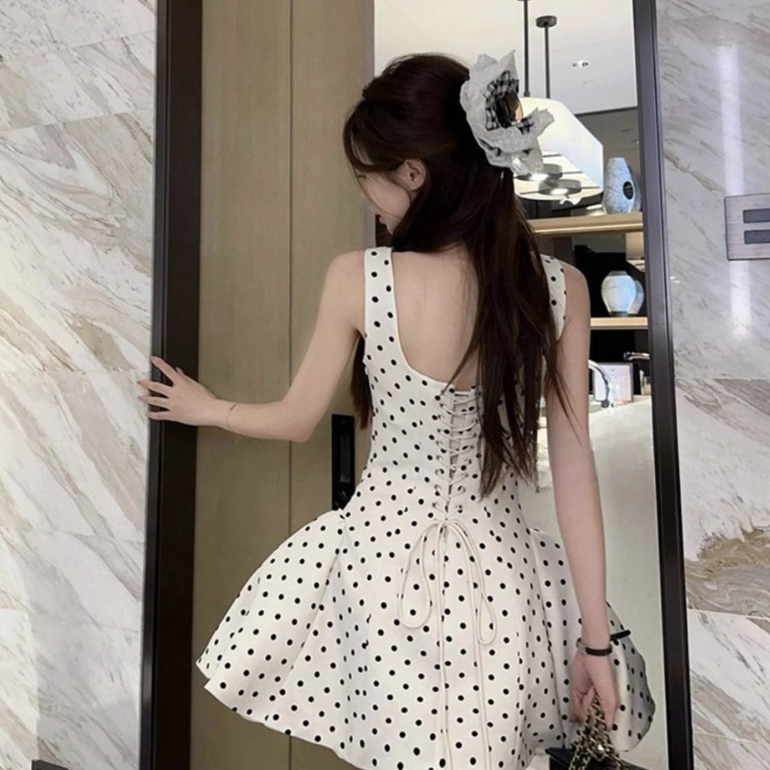 Summer 2025 French polka dot lace up dress, summer new style tie, high-end elegant waist cinching, slim trend fit, fluffy short skirt, women's ne