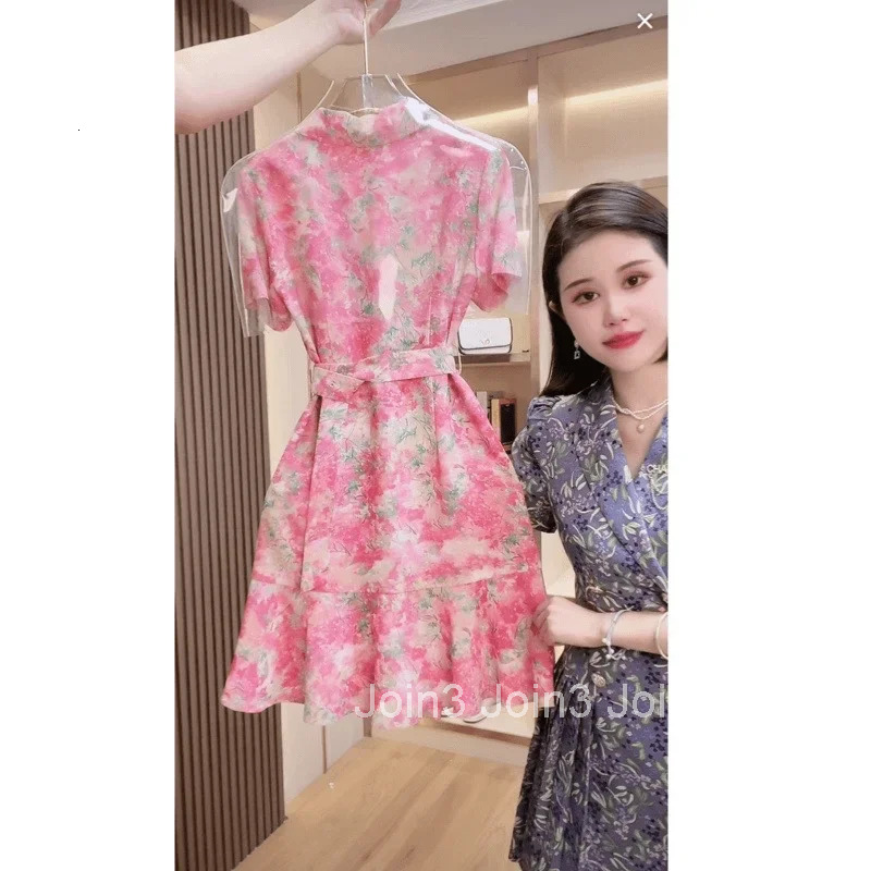 French fashion floral double-breasted belt dress female summer new temperament Joker slim waist sweet and elegant skirt.