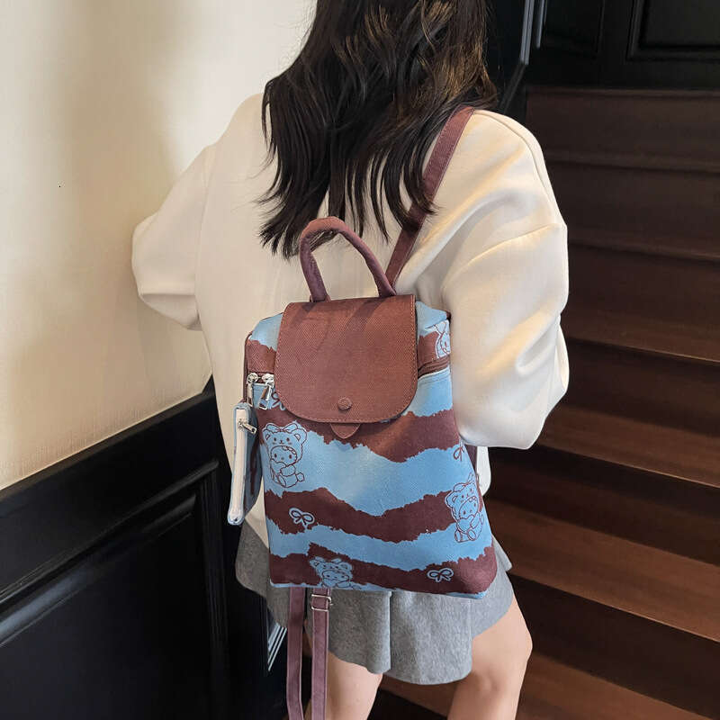 Casual shoulder bag-Street style color blocked handbag with cartoon animal stripe texture, outdoor women's daily use backpack