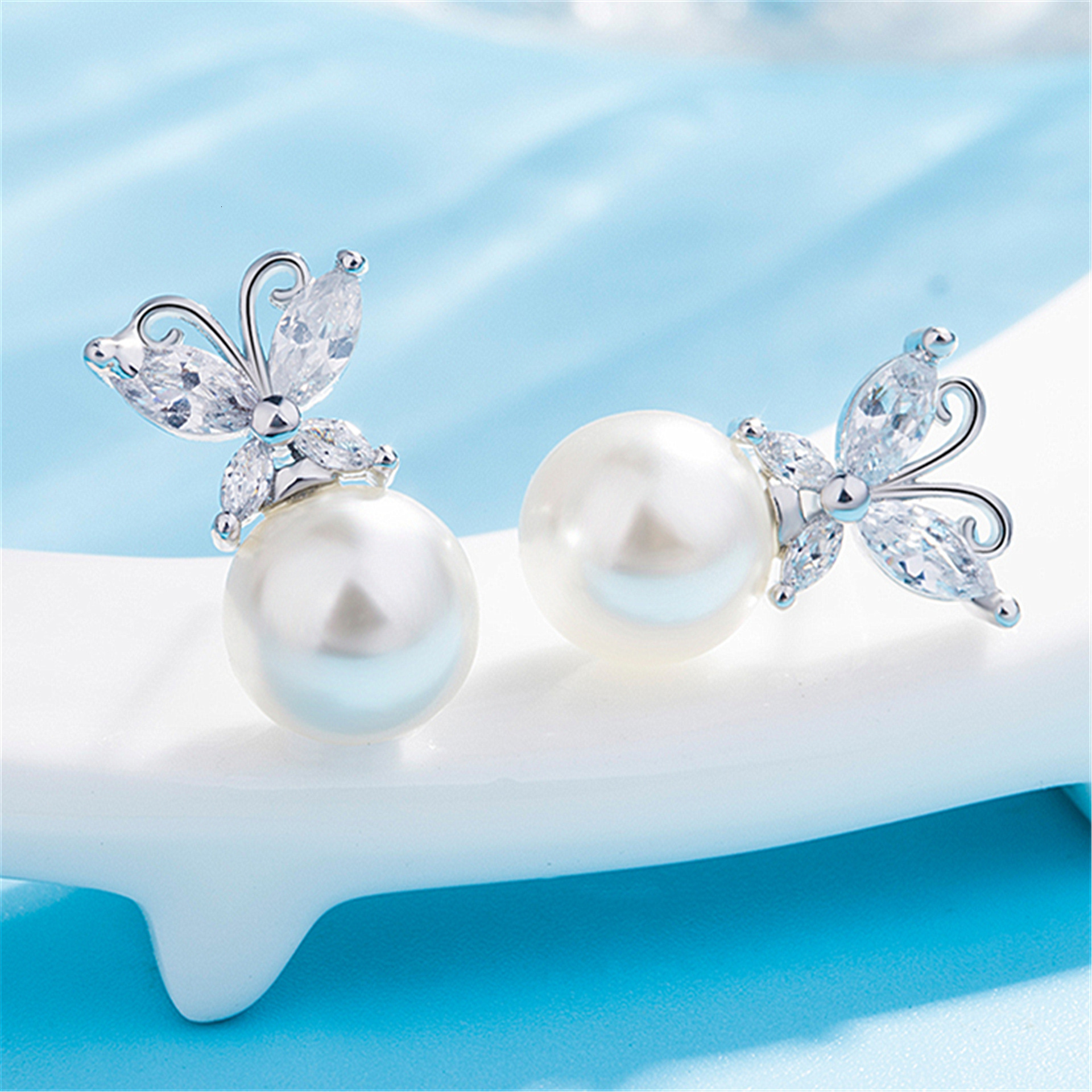 Free Shipping Designer Luxury Jewelry Elegant Women's Silver Earrings Fashion Diamond-encrusted Butterfly Pearl Pendant Simple Fresh Earrings Ear
