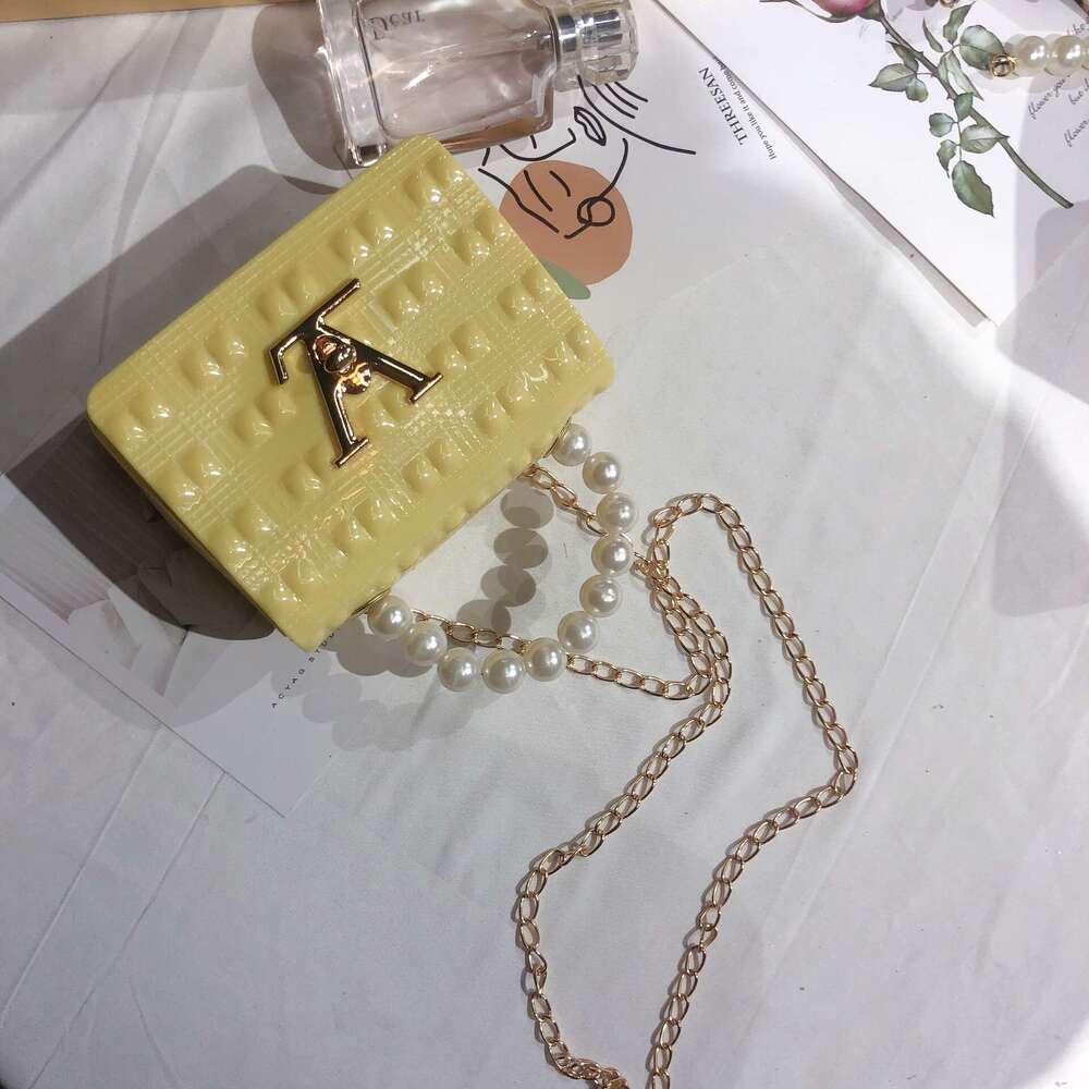DHcollections 2025 New Pearl Handheld Mini Jelly Quilted Women's Candy Color Small Square Single Shoulder Crossbody Chain Bag