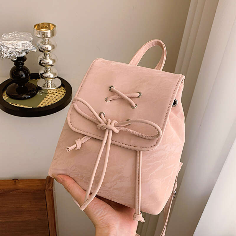 Bow tie women's Korean style backpack student school multifunctional travel bag, suitable for women's leisure outings, shopping, and dates