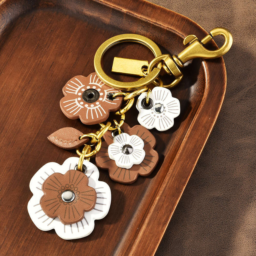 DHessentials Floral Cluster Bag Charm - Trendy PU Leather Flower Keychain for Women, Elegant Shoulder Bag Accessory (10cm, 30g)