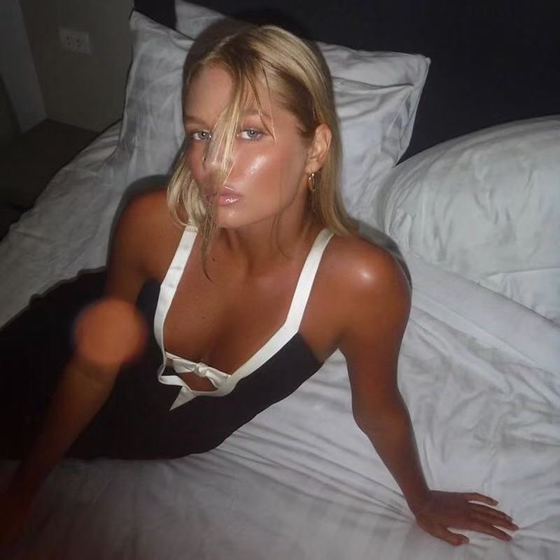 Women's European and American style sexy deep suspender skirt solid color temptation bow decoration splicing color temperament long skirt