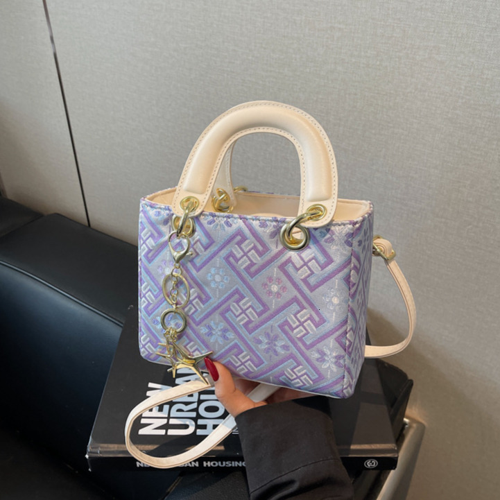 Free Shipping Designer Luxury Women's Handbag High-end Ethnic Style Wanji Pattern National Style New Handheld Bucket Bag Versatile Single Shoulde