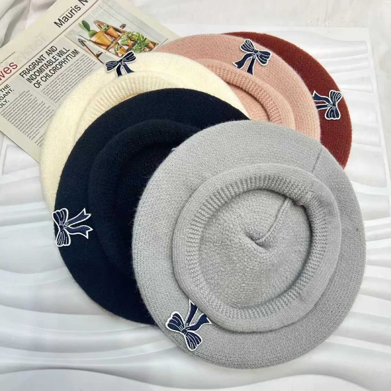 2025 new large-scale curling edge casual versatile bow sticker knitted beret simple and comfortable trendy hat XJ250807