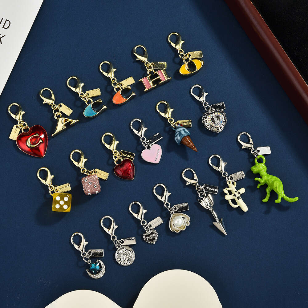 DHessentials Dinosaur Ice Cream Keychain - Cute Cartoon Bag Charm with Fruit Pendants, Trendy Metal Keyring for Kids & Teens (10cm, 7g)