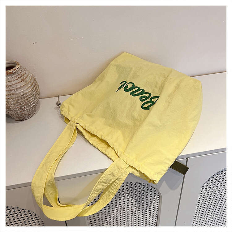 Women's Korean Version Of Handbag, New Letter Printed Nylon Shoulder Bag, Casual And Versatile, Portable Drawstring,