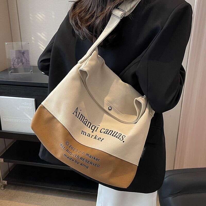 Canvas for Women with Large Capacity in 2024 New Texture Contrasting Color Summer Single Shoulder Crossbody Popular Commuting Tote Bag