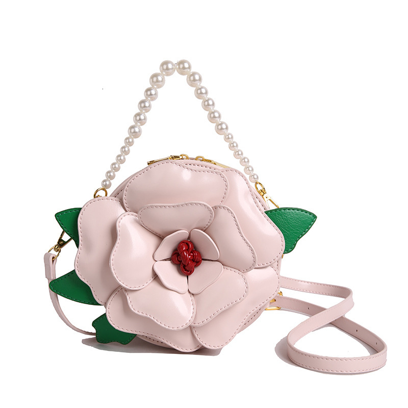Free shipping designer Niche Design Floral Small Round Bag for Women Creative Light Luxury Shoulder Bag Crossbody Bag Socialite Pearl Handbag Evening 