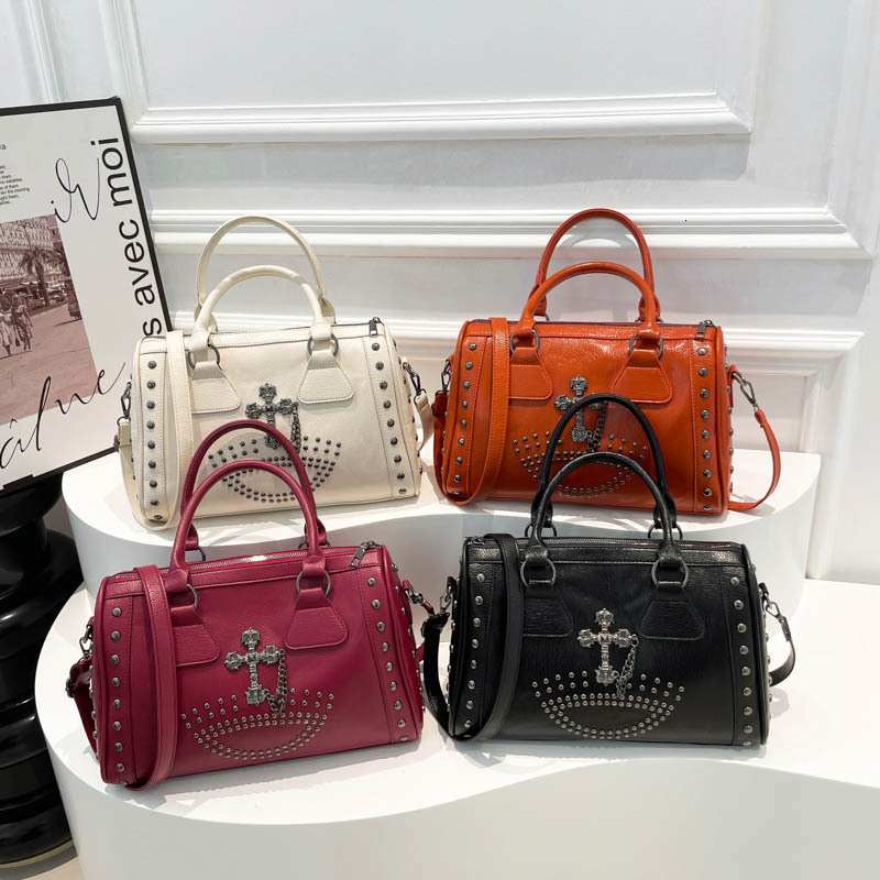 Free shipping designer Large Capacity Punk Style Commuter Boston Cylinder Handbag for Women Niche Retro Rivet Shoulder Bag